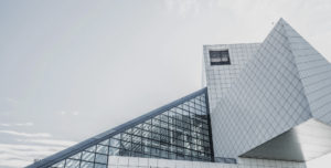 A modern building over a blue sky.