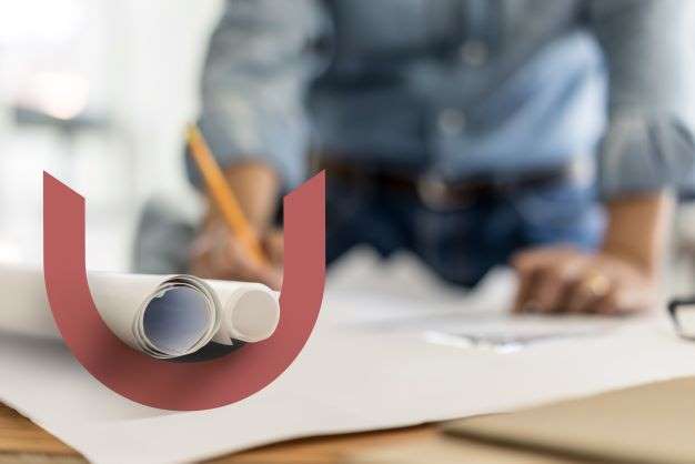 A curved red graphic holds architectural drawings. An architect at work in the background.