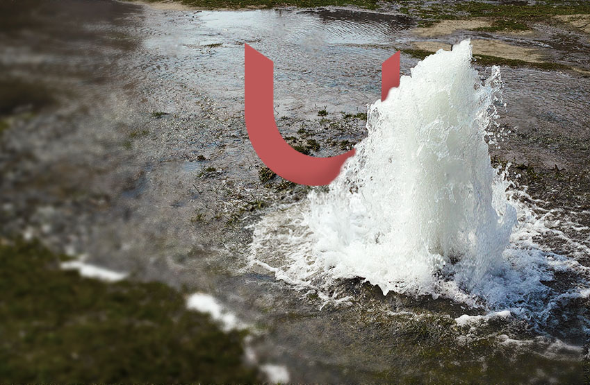 Water gushing up from the earth.